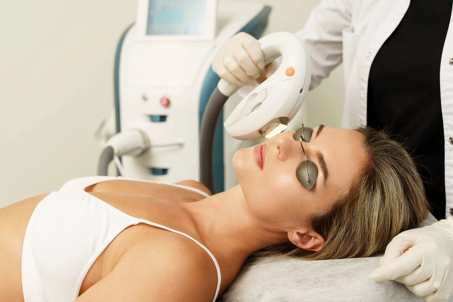 IPL treatment being performed on a patient's face