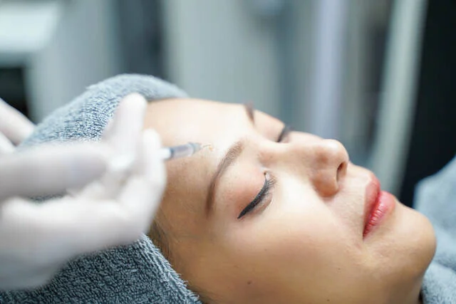 Platelet Rich Plasma treatment being performed on a patient's face